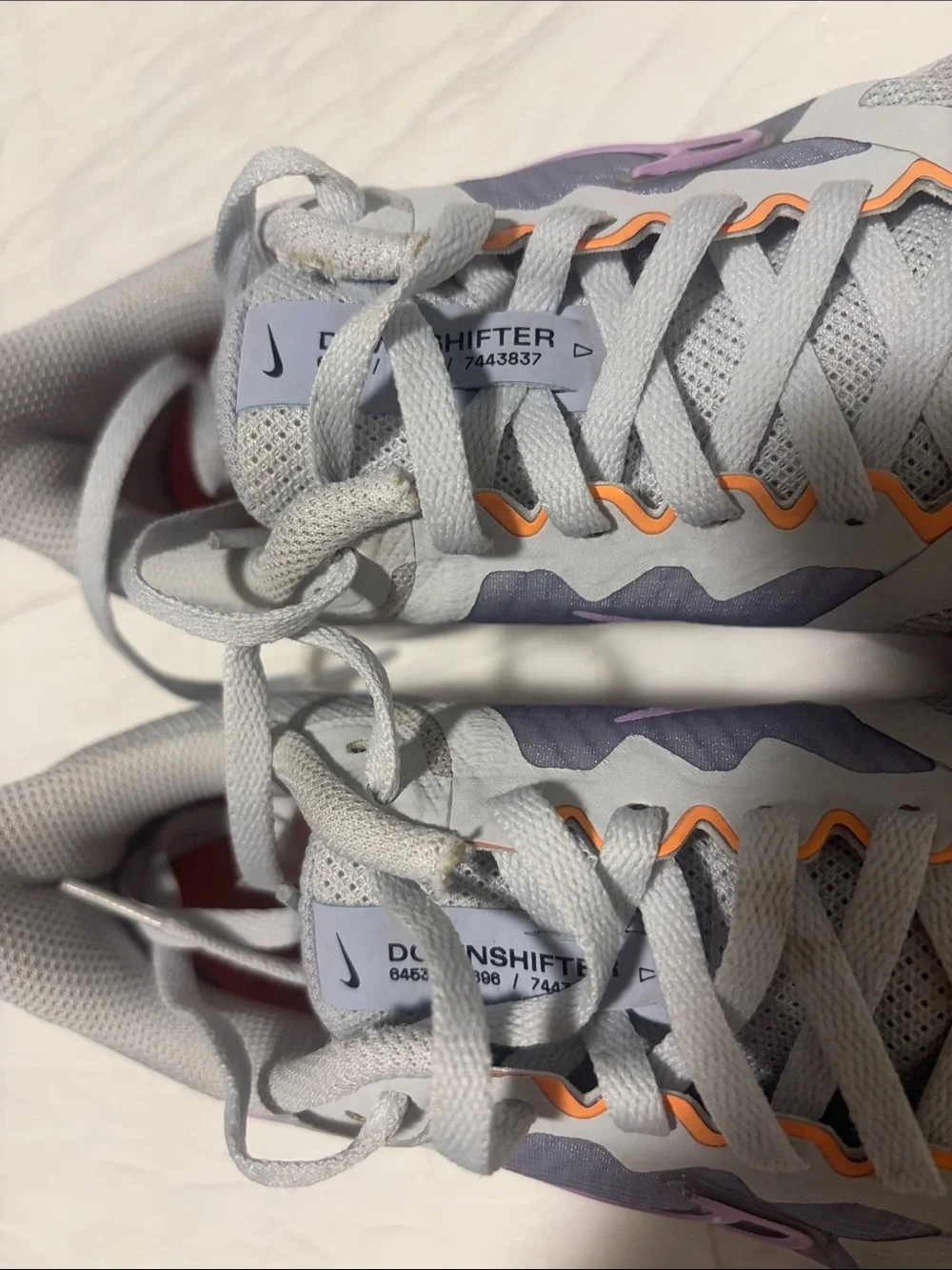 Nike Downshifter Running Shoes with Purple Swoosh and Orange Accents